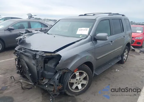 2009 Honda Pilot Touring z USA, uszkodzony, nr VIN 5FNYF48849B029552